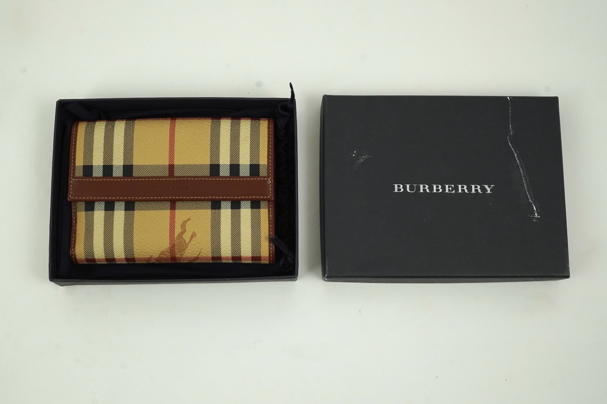 A Burberry brown tartan scarf, sunglasses with case and wallet with original box.